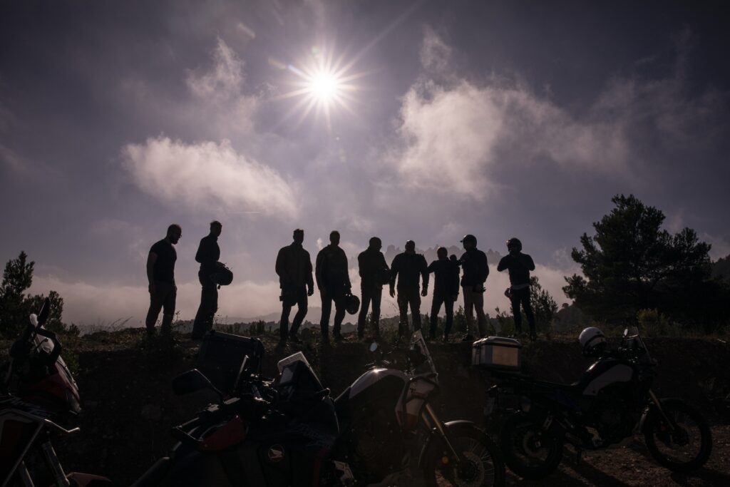 Motorcycle Group silhoutte with Montserrat mountain range in Spain